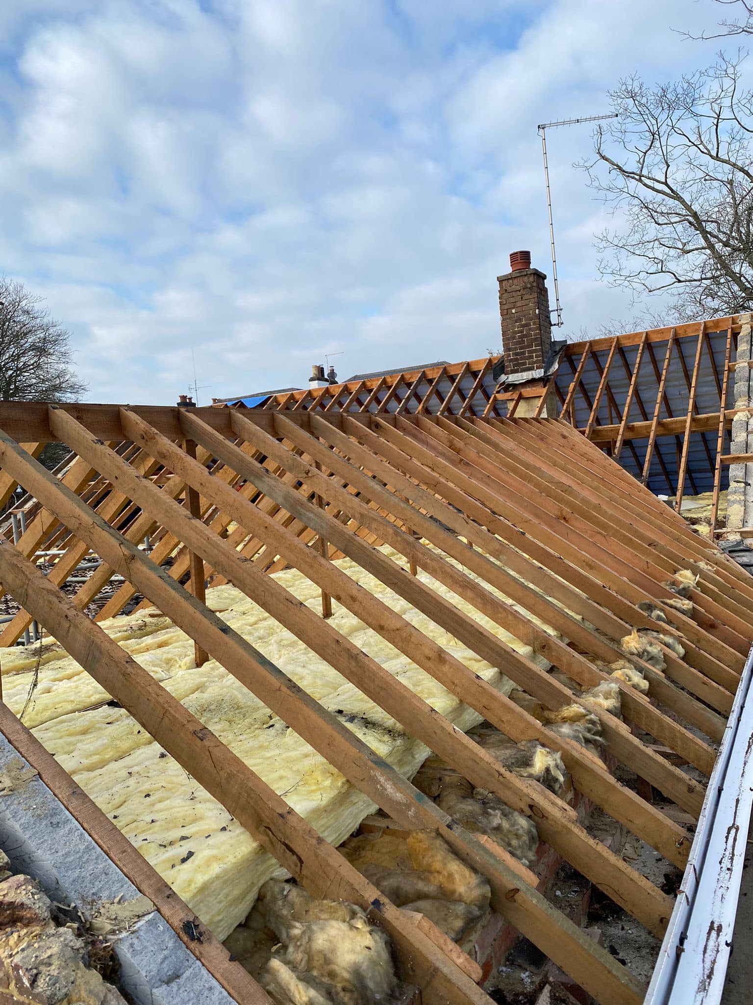 Professional roofers working on a property in London - KS Roof Master