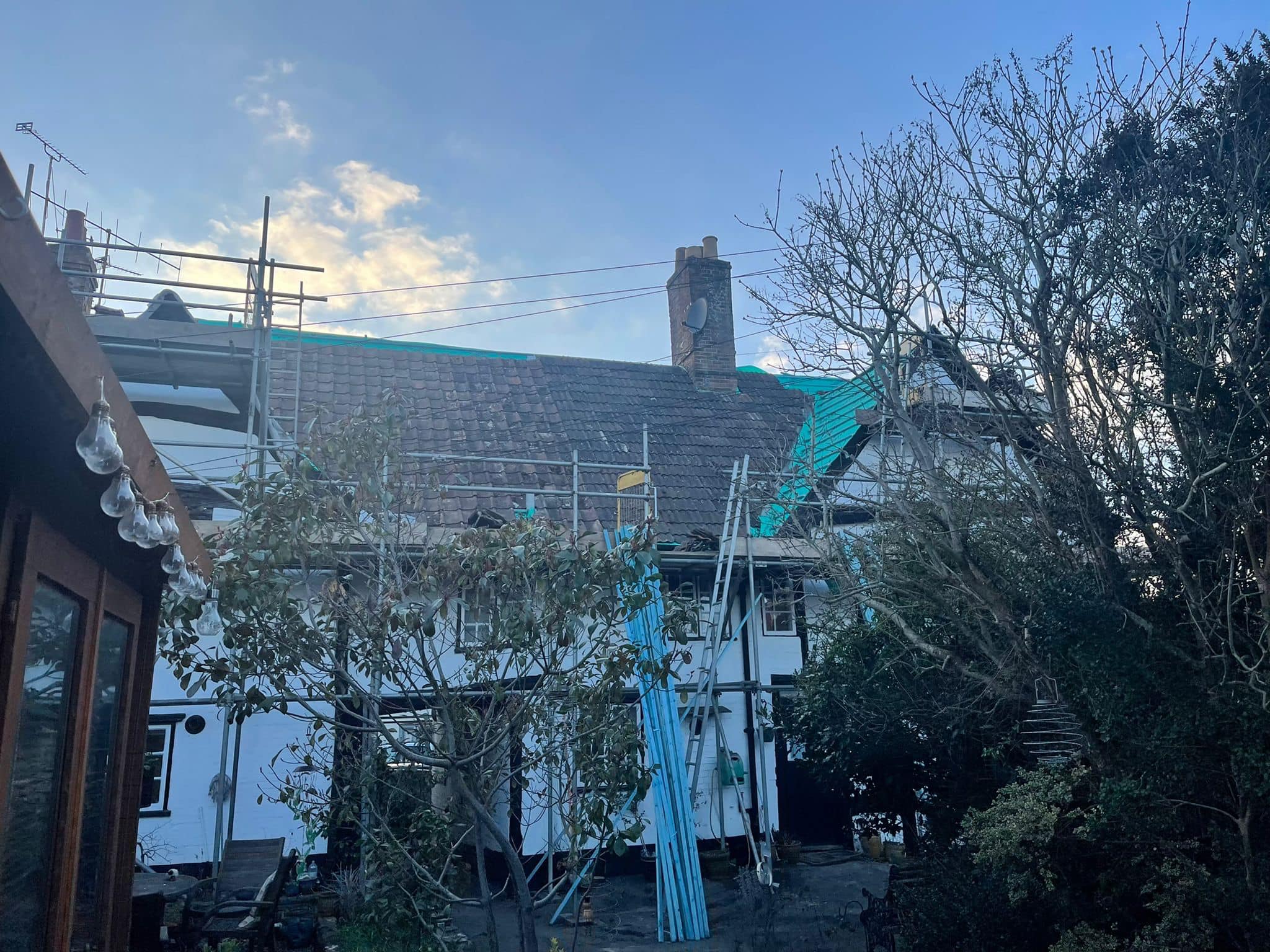 Professional roofers working on a property in London - KS Roof Master