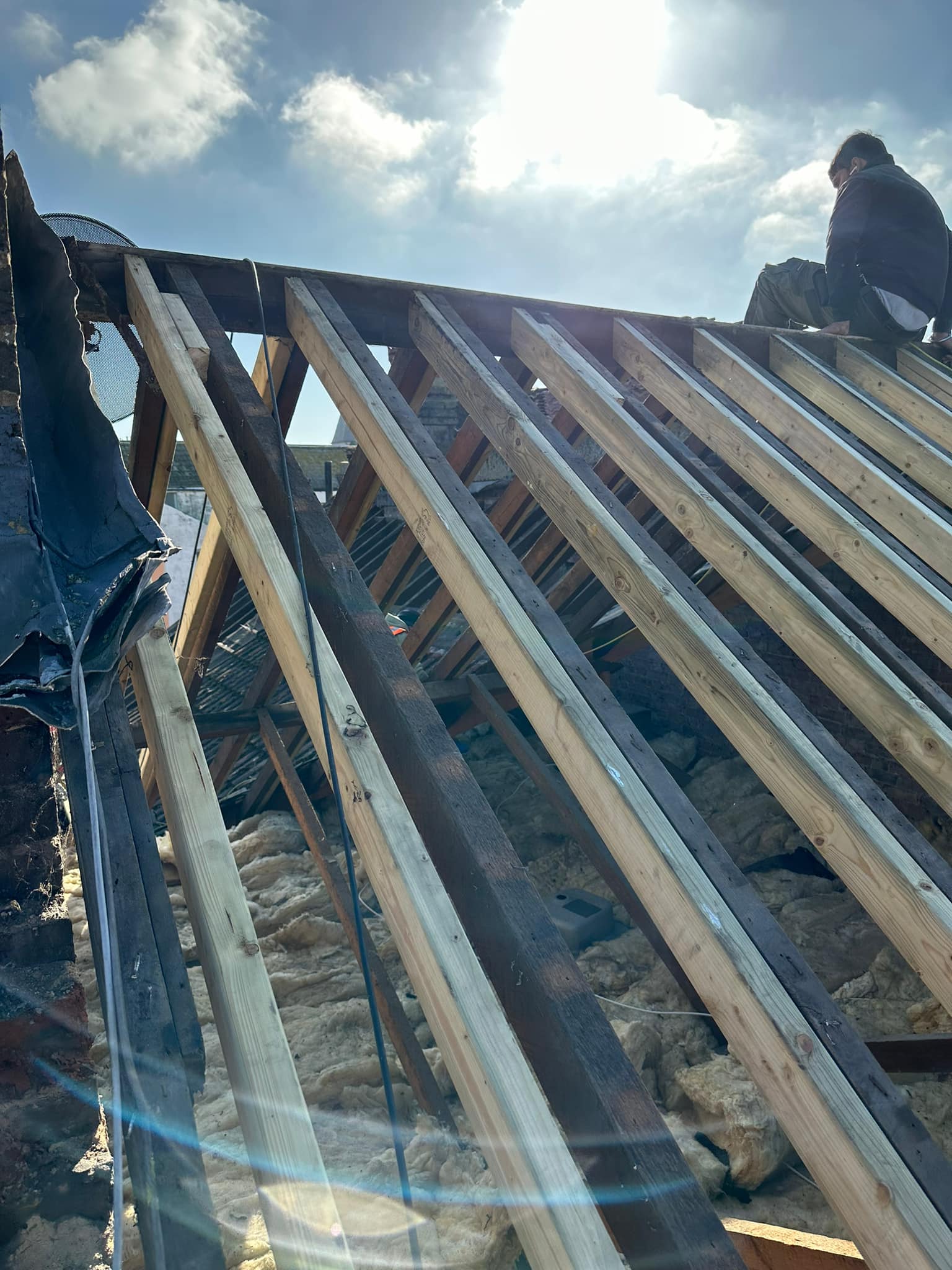 Professional roofers working on a property in London - KS Roof Master