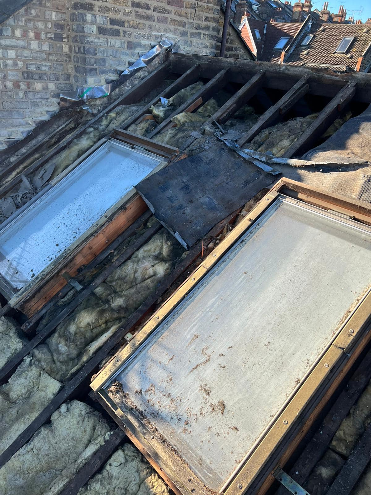 Professional roofers working on a property in London - KS Roof Master