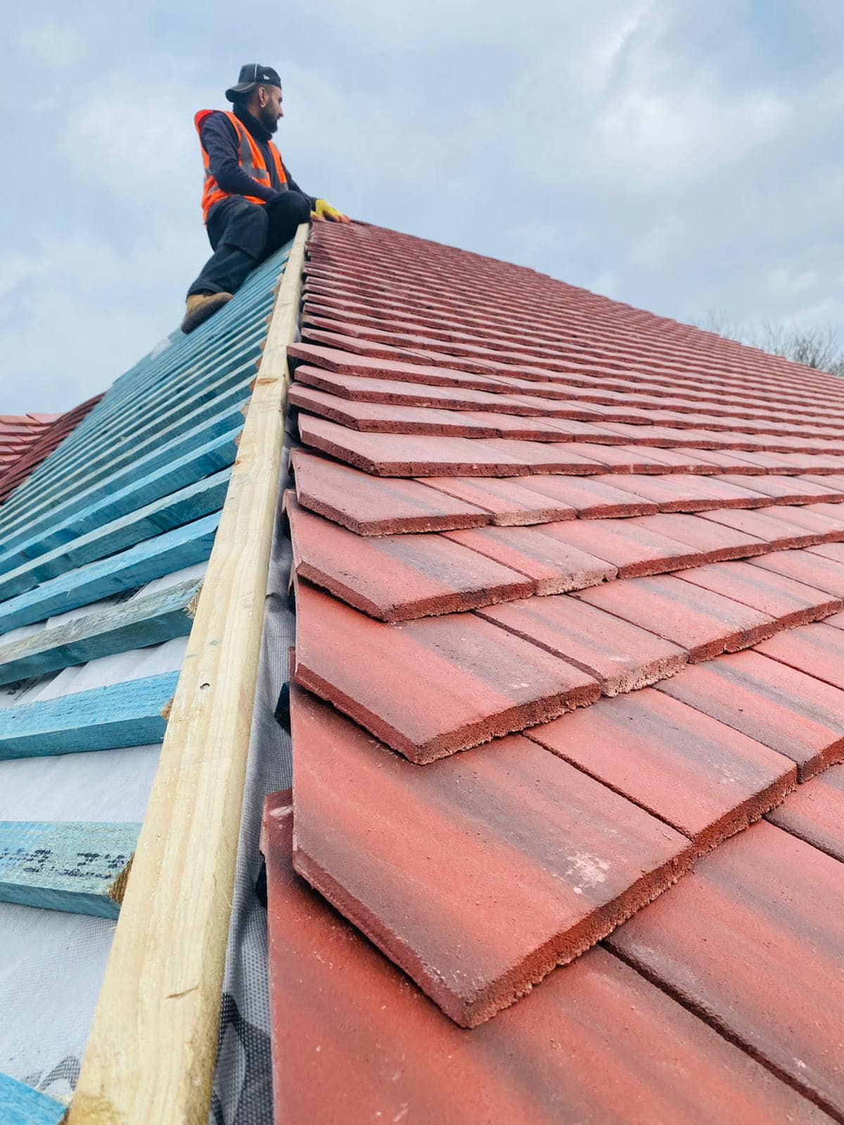 Professional roofers working on a property in London - KS Roof Master