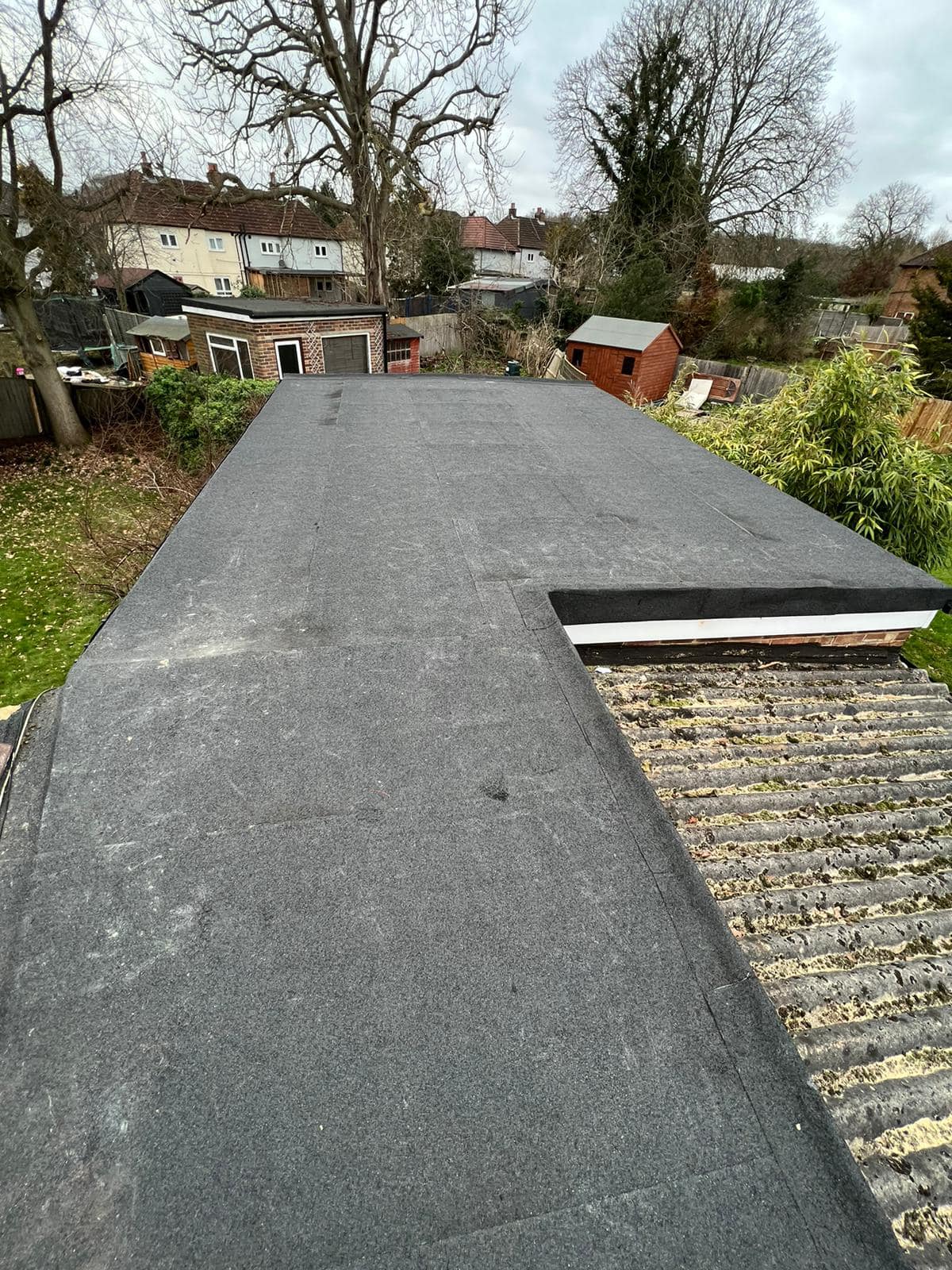 Professional roofers working on a property in London - KS Roof Master