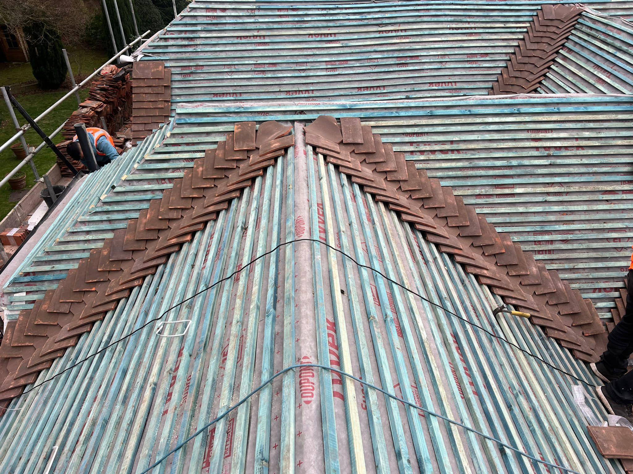 Professional roofers working on a property in London - KS Roof Master