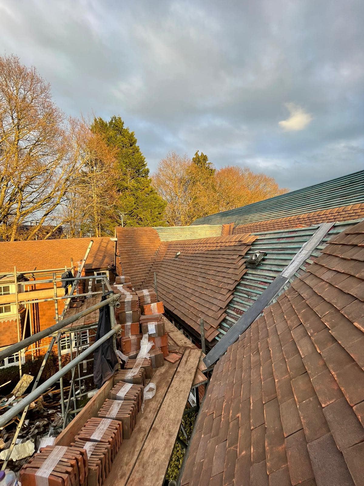 Professional roofers working on a property in London - KS Roof Master