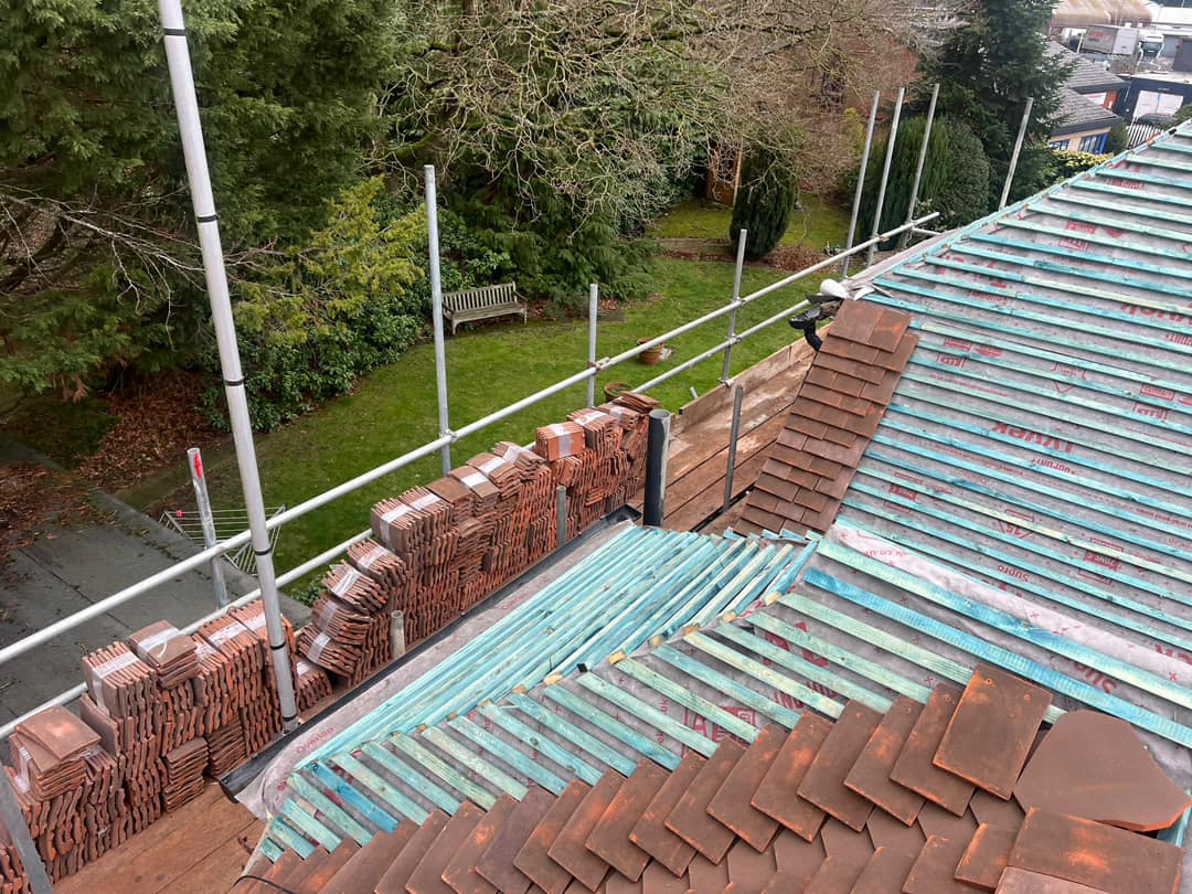 Professional roofers working on a property in London - KS Roof Master
