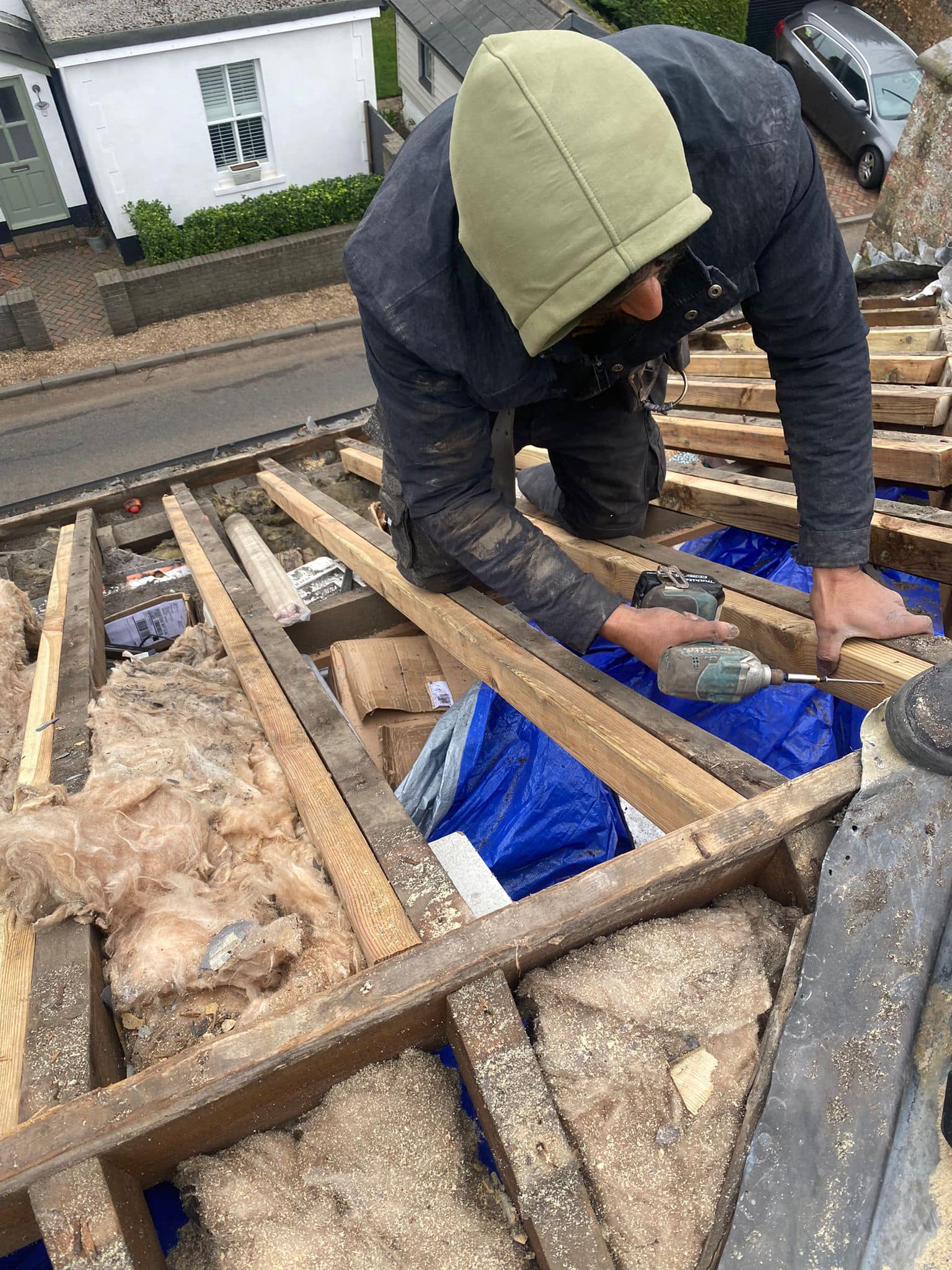 Professional roofers working on a property in London - KS Roof Master