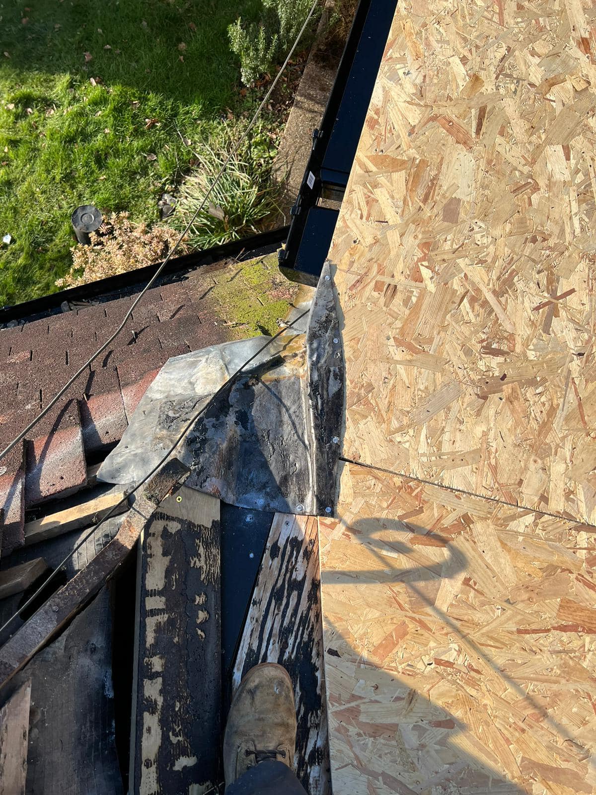 Professional roofers working on a property in London - KS Roof Master