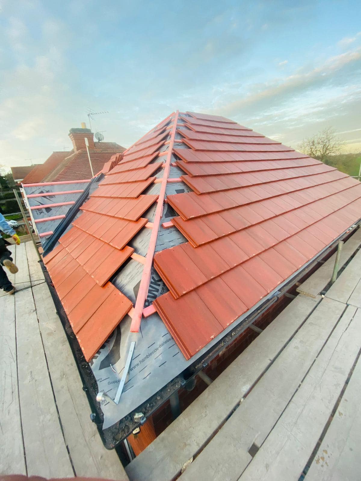 Professional roofers working on a property in London - KS Roof Master