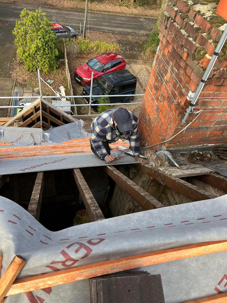 Professional roofers working on a property in London - KS Roof Master
