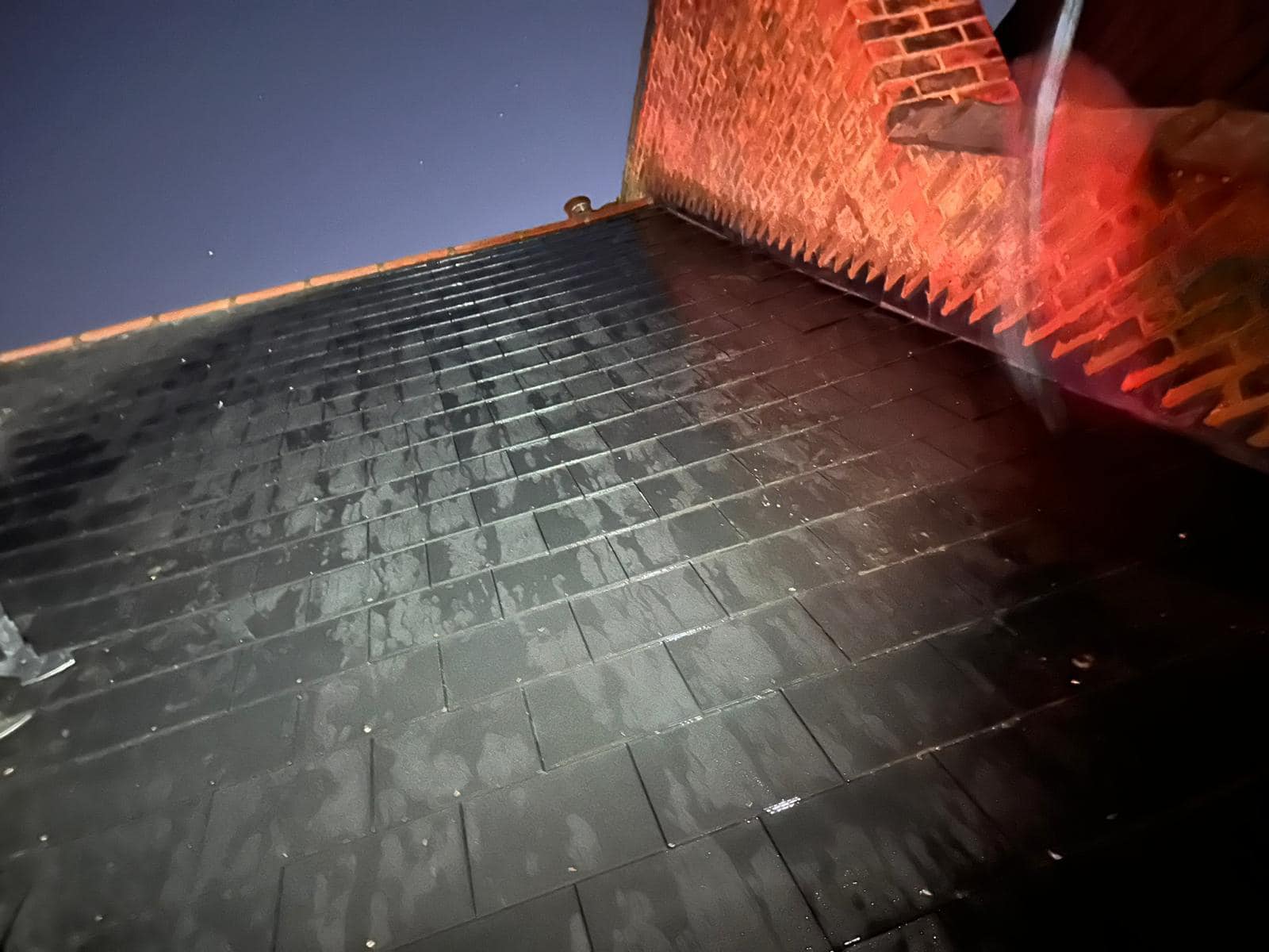 Professional roofers working on a property in London - KS Roof Master