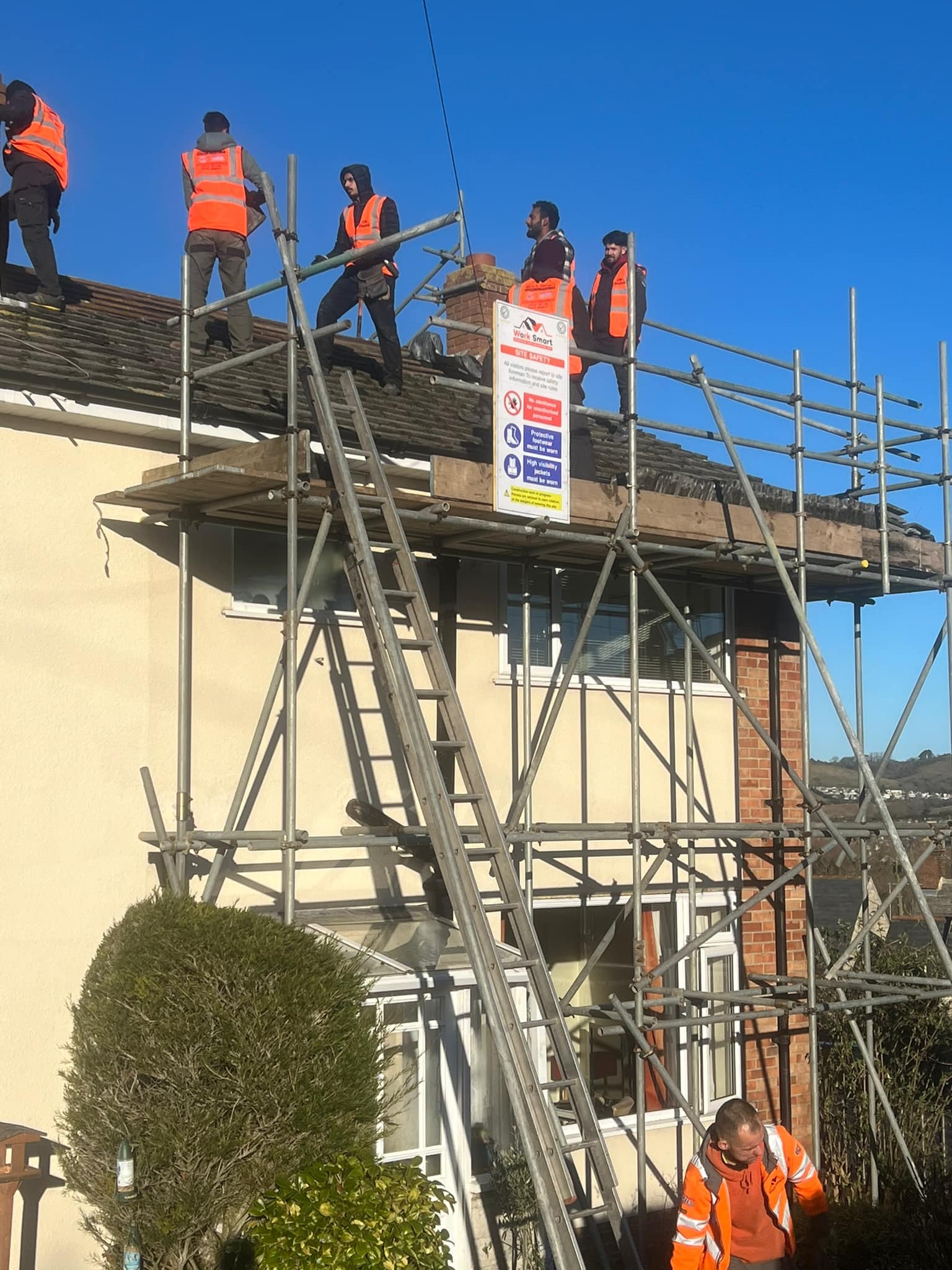 Professional roofers working on a property in London - KS Roof Master