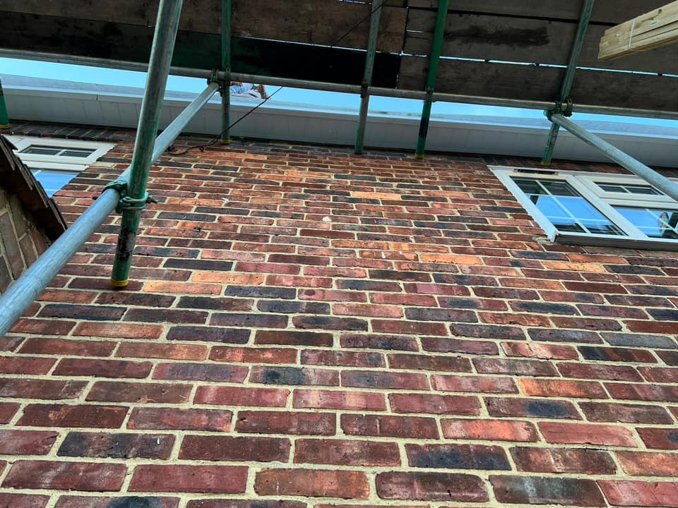 Professional roofers working on a property in London - KS Roof Master