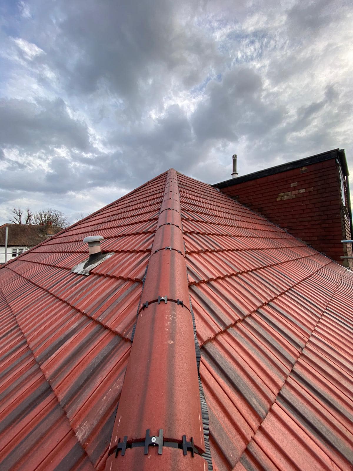 Professional roofers working on a property in London - KS Roof Master