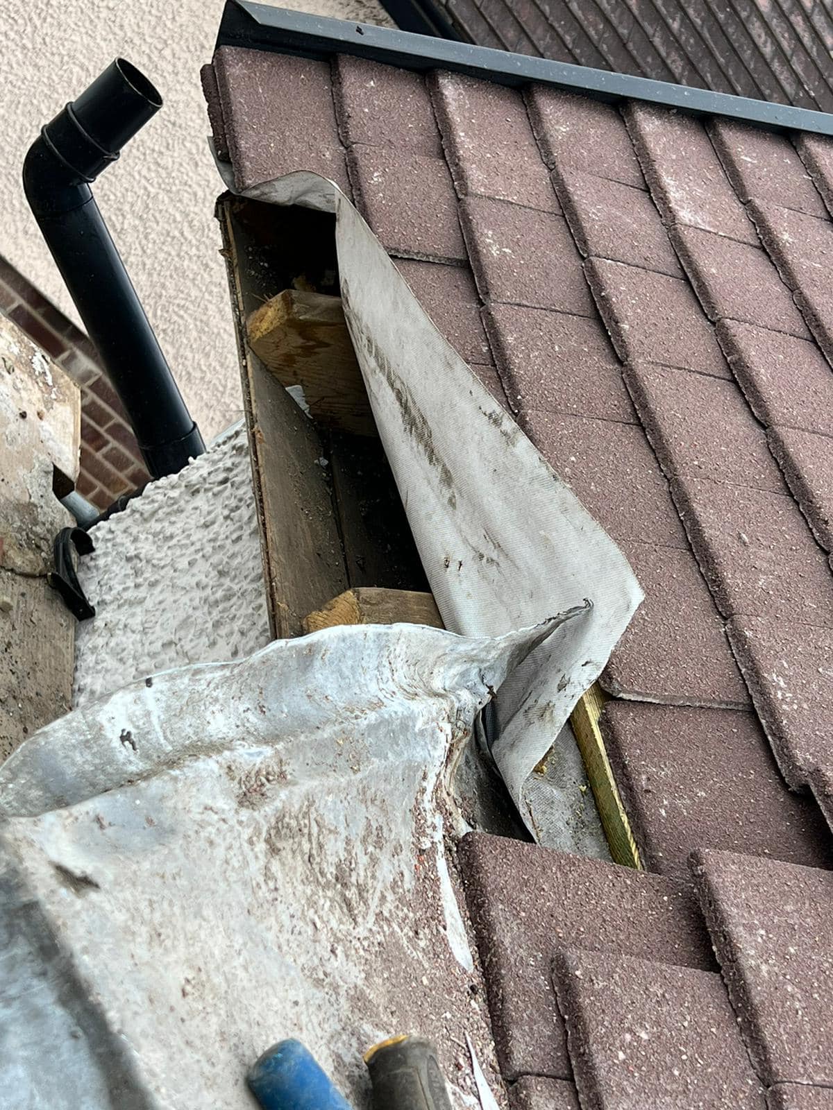 Professional roofers working on a property in London - KS Roof Master