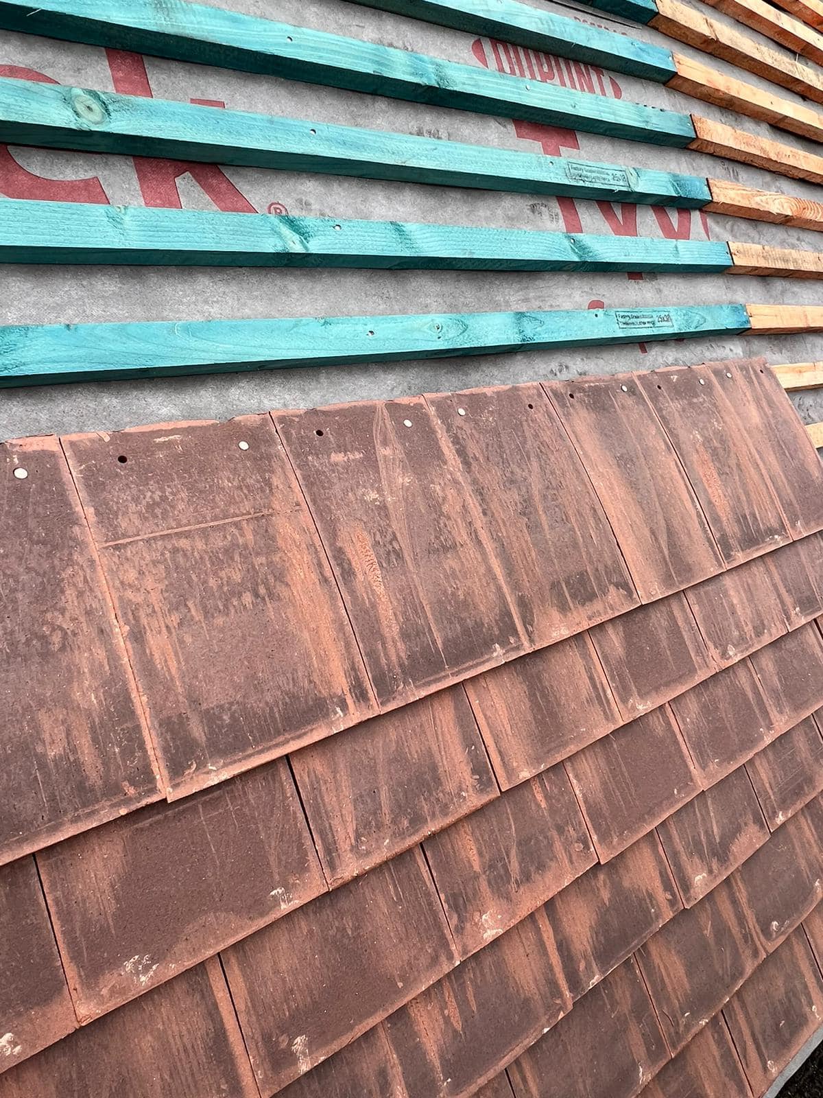 Professional roofers working on a property in London - KS Roof Master