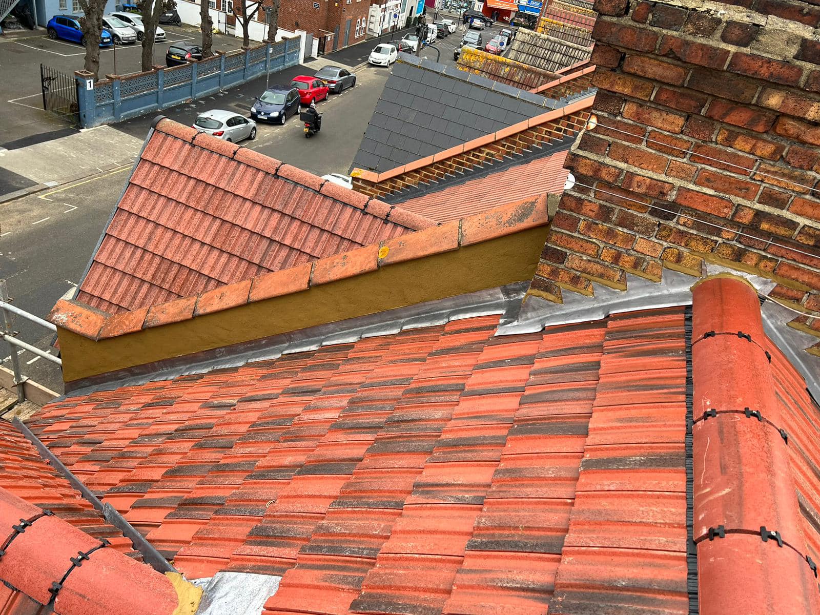 Professional roofers working on a property in London - KS Roof Master