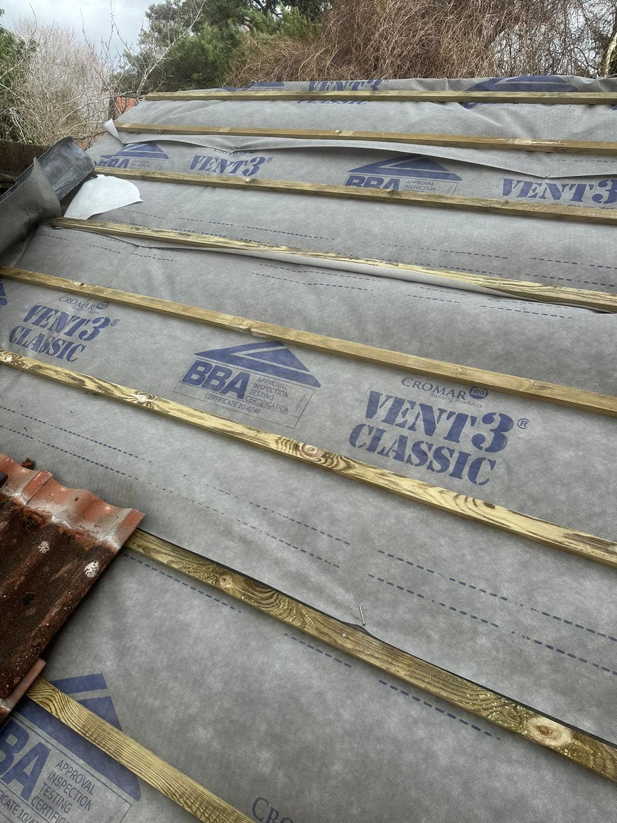 Professional roofers working on a property in London - KS Roof Master