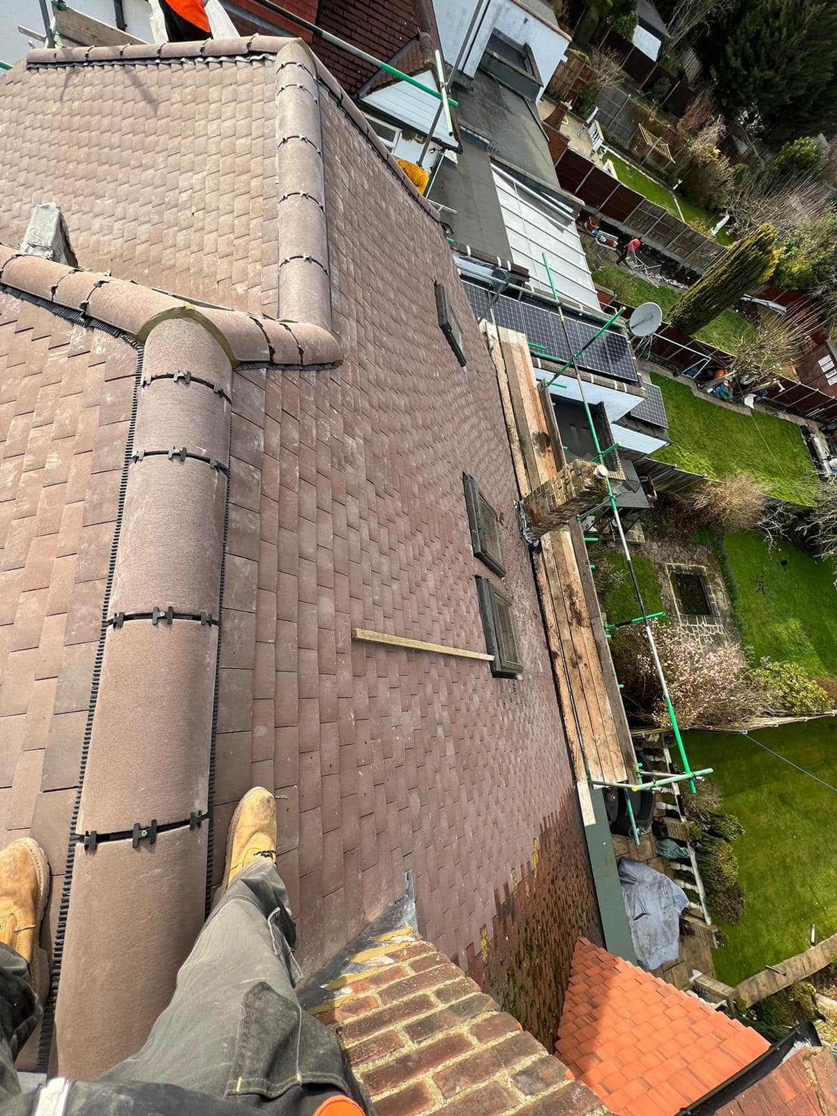 Professional roofers working on a property in London - KS Roof Master