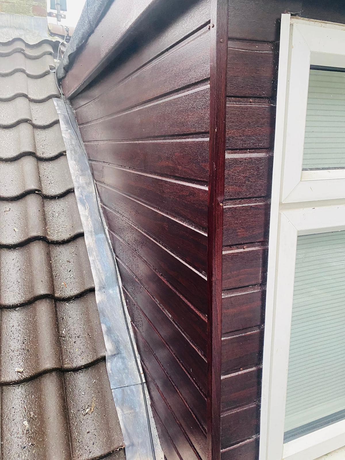 Professional roofers working on a property in London - KS Roof Master