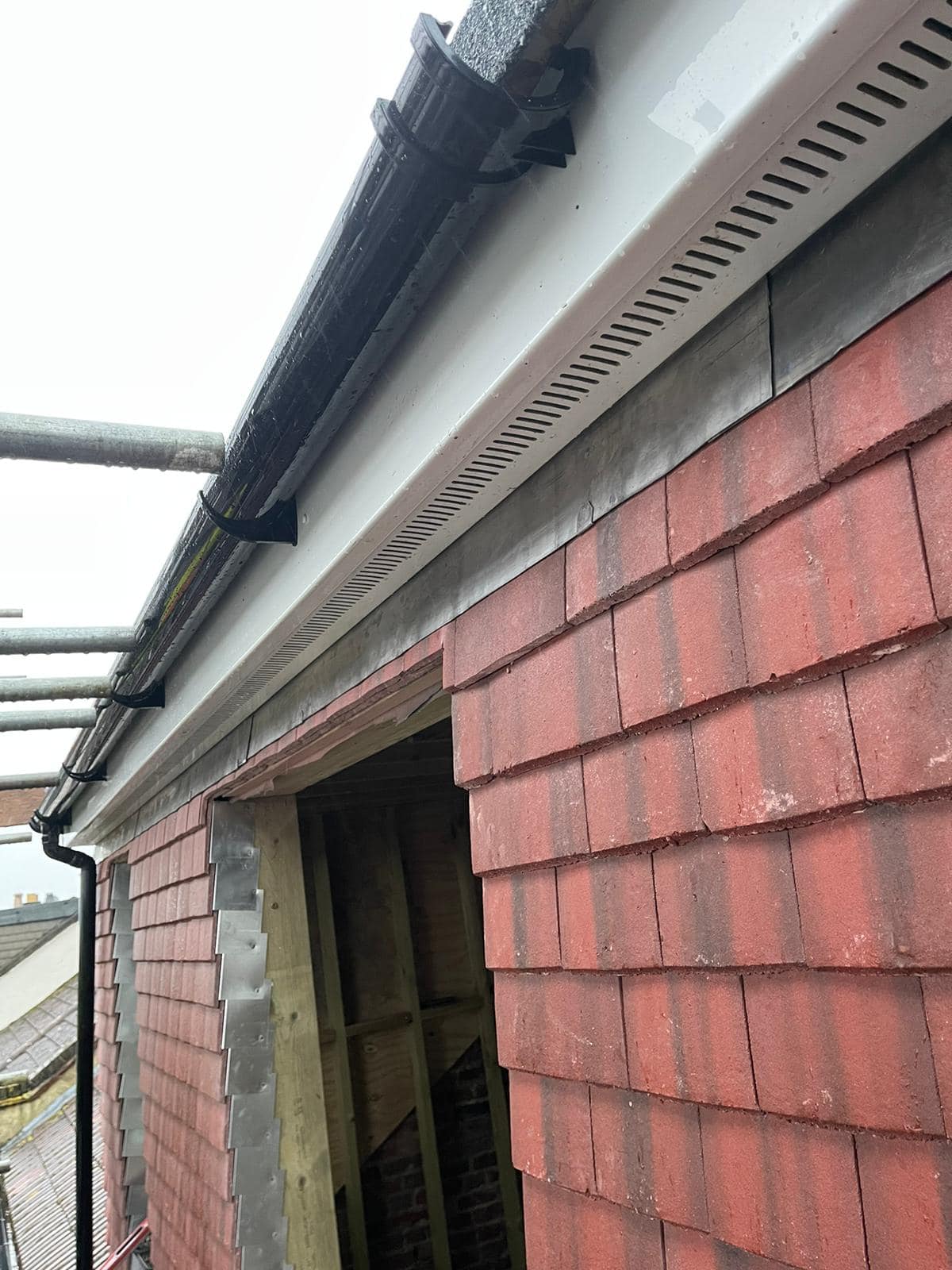 Professional roofers working on a property in London - KS Roof Master