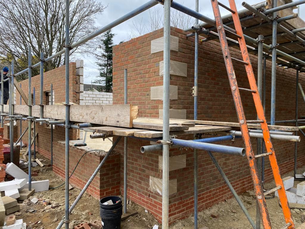 Professional roofers working on a property in London - KS Roof Master