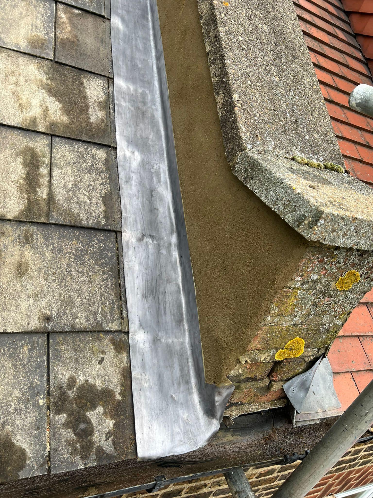 Professional roofers working on a property in London - KS Roof Master