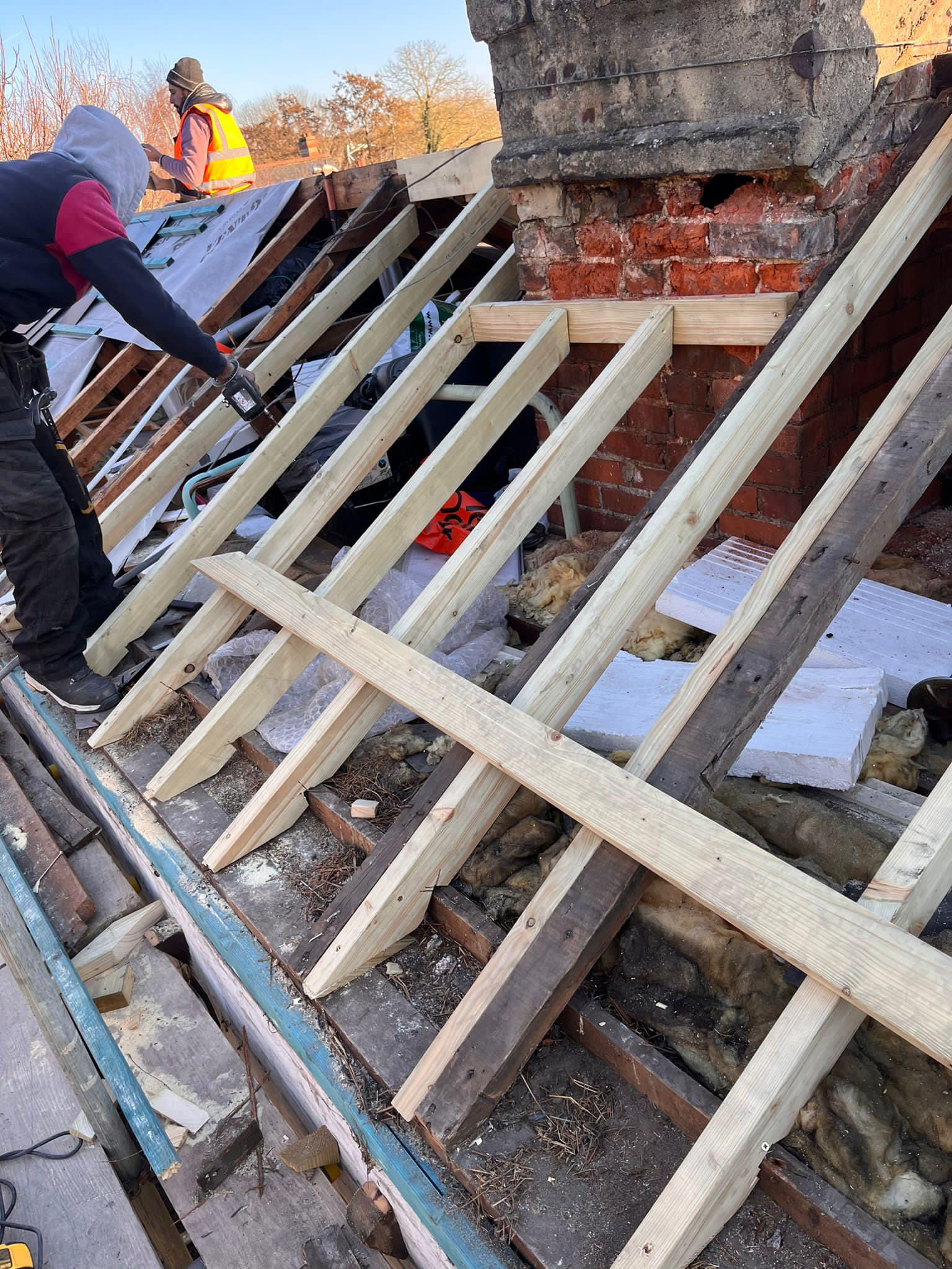 Professional roofers working on a property in London - KS Roof Master