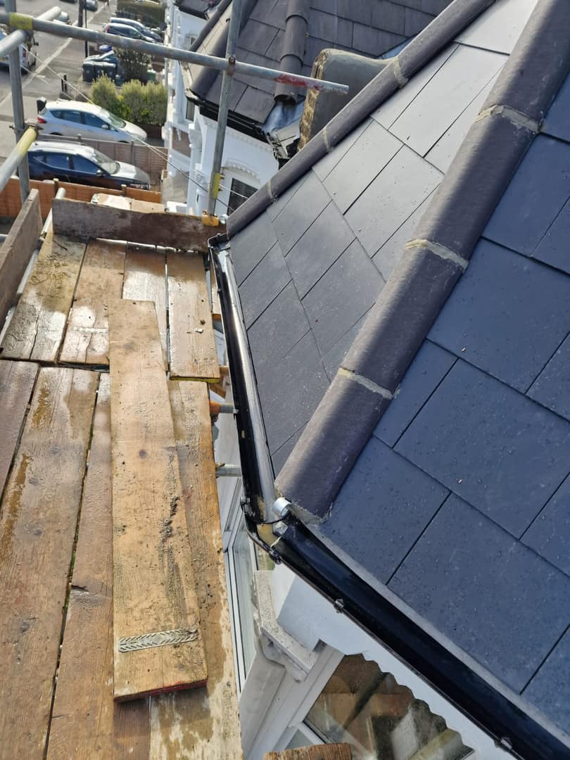 Professional roofers working on a property in London - KS Roof Master