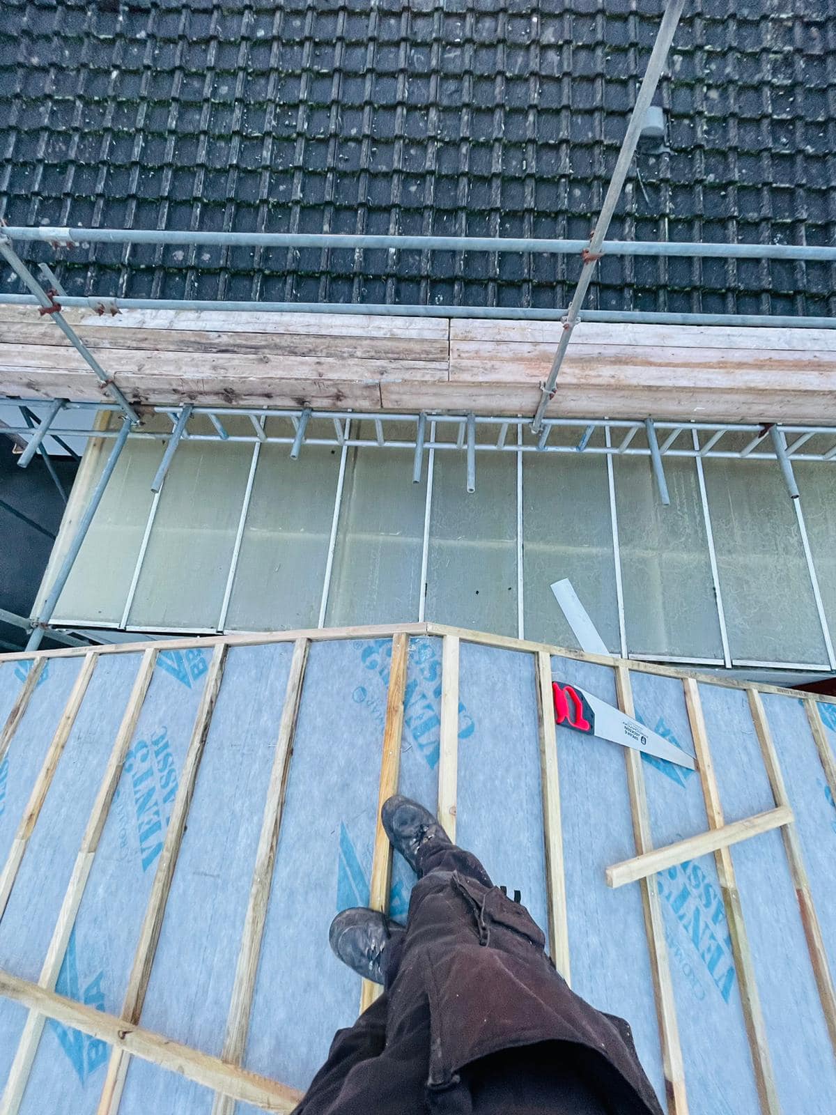 Professional roofers working on a property in London - KS Roof Master