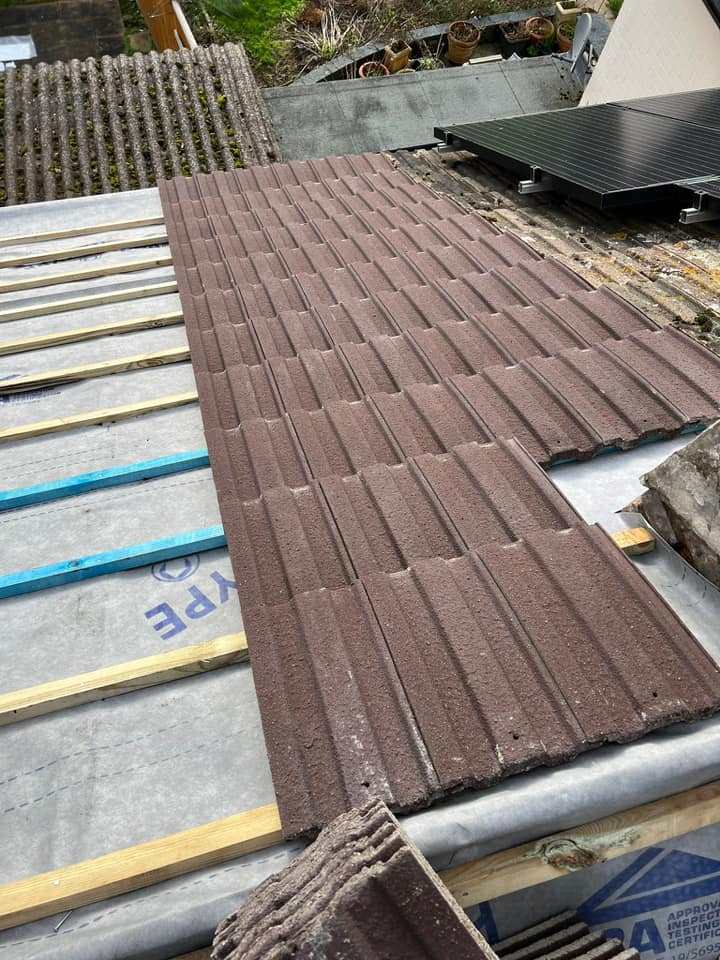 Professional roofers working on a property in London - KS Roof Master