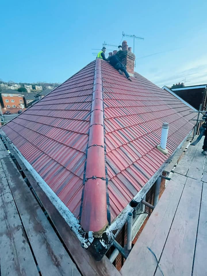 Professional roofers working on a property in London - KS Roof Master