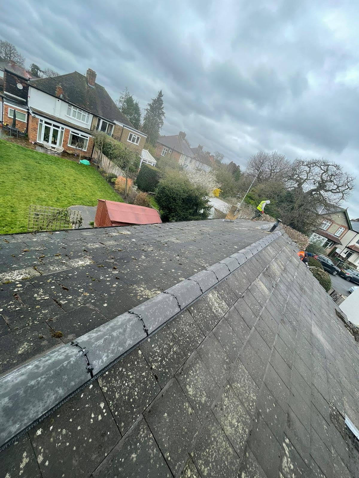 Professional roofers working on a property in London - KS Roof Master