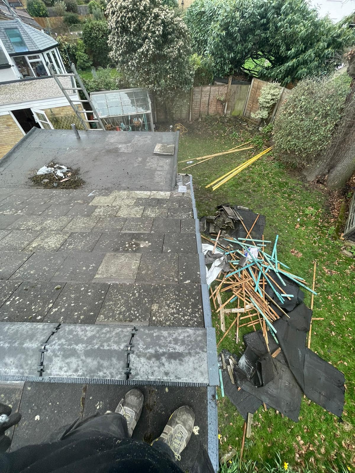 Professional roofers working on a property in London - KS Roof Master