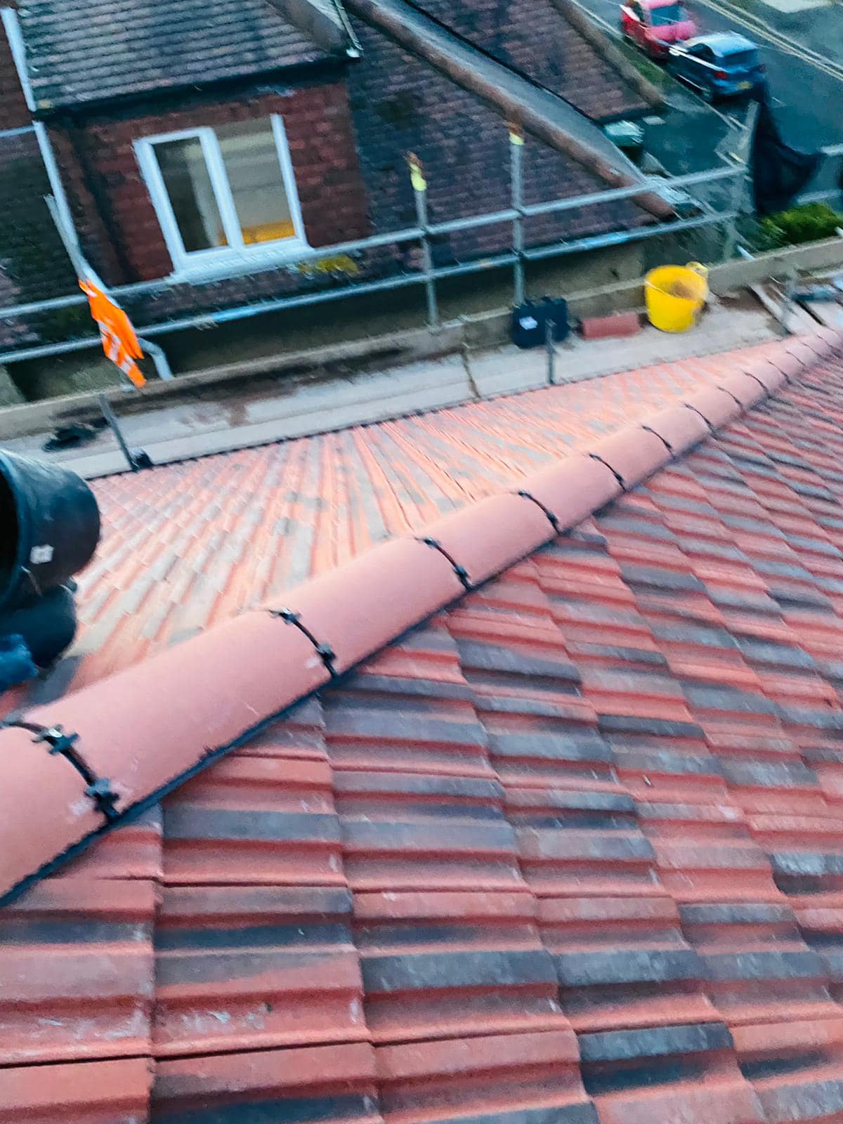Professional roofers working on a property in London - KS Roof Master