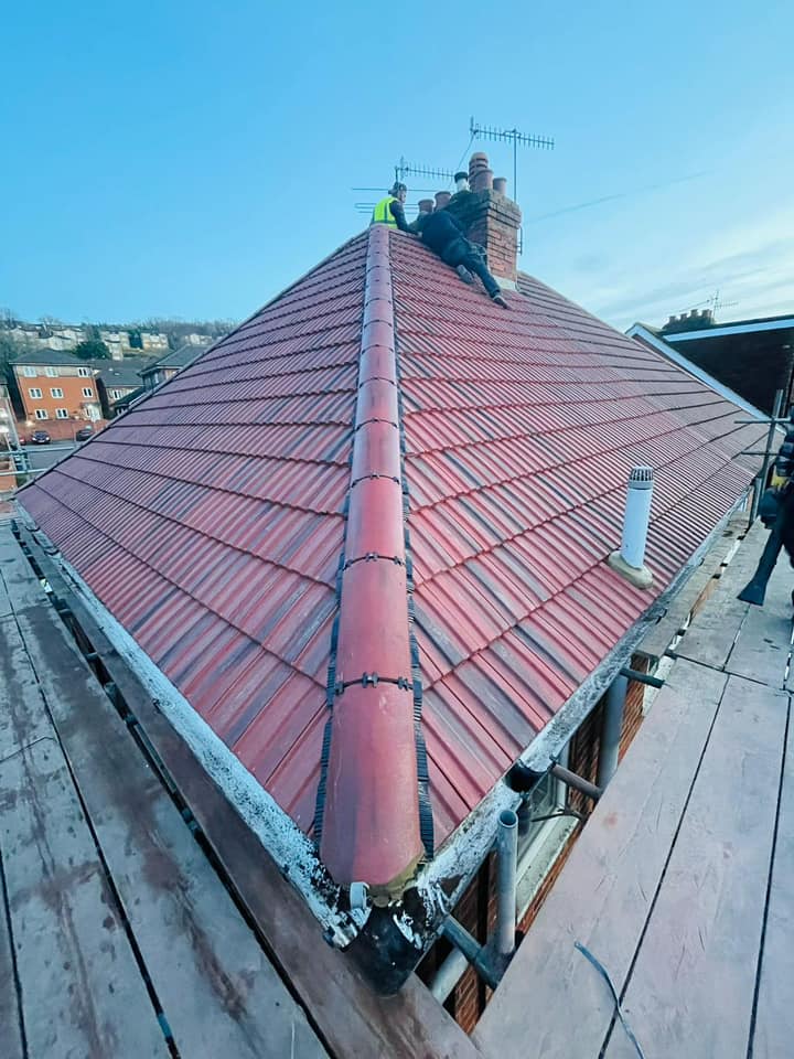 Professional roofers working on a property in London - KS Roof Master