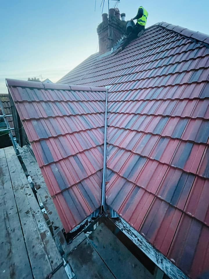 Professional roofers working on a property in London - KS Roof Master