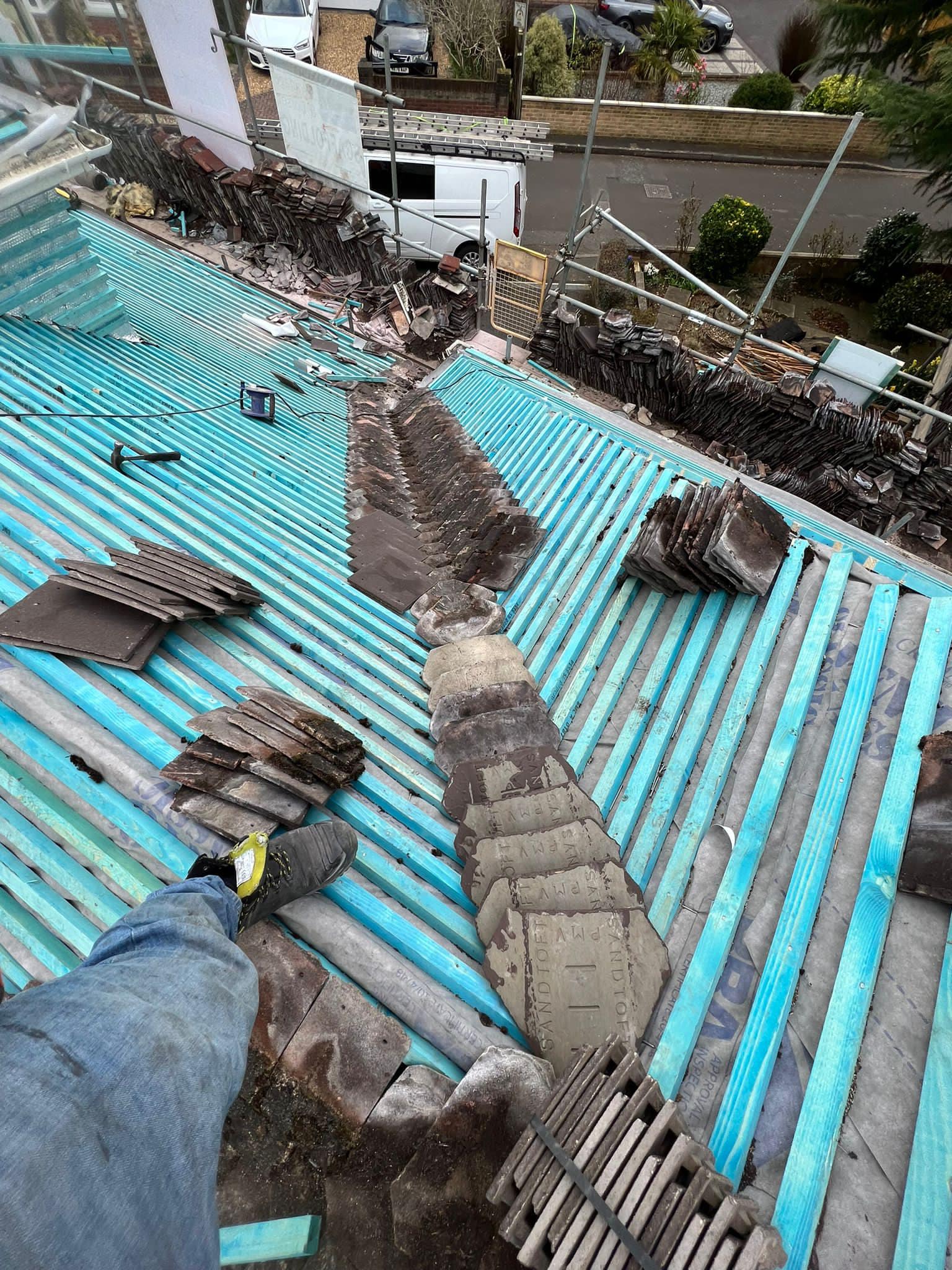 Professional roofers working on a property in London - KS Roof Master