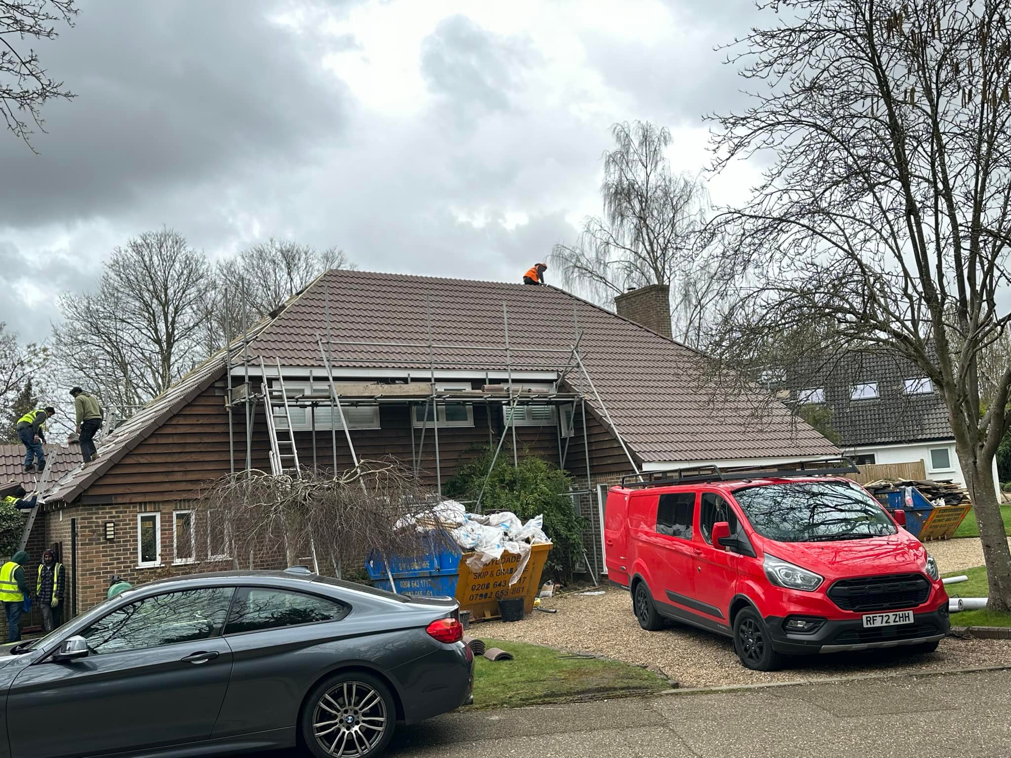 Professional roofers working on a property in London - KS Roof Master