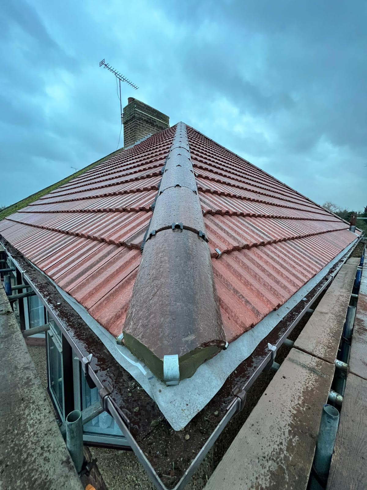 Professional roofers working on a property in London - KS Roof Master