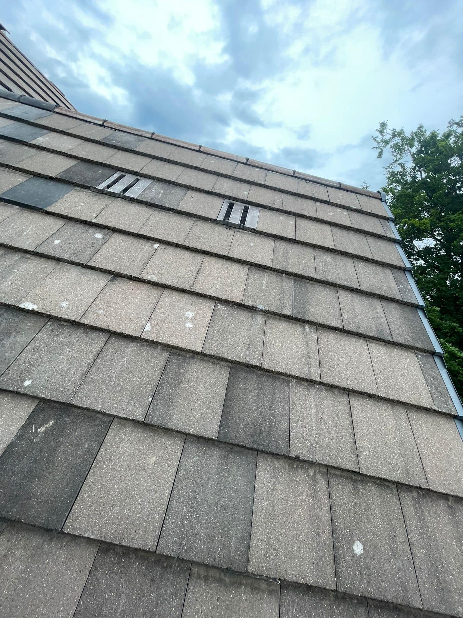 Professional roofers working on a property in London - KS Roof Master