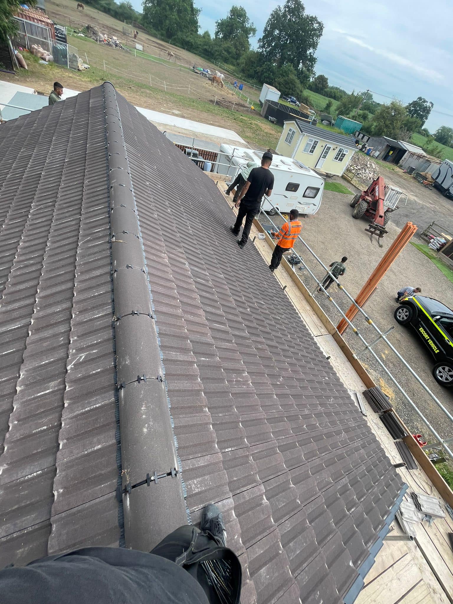 Professional roofers working on a property in London - KS Roof Master
