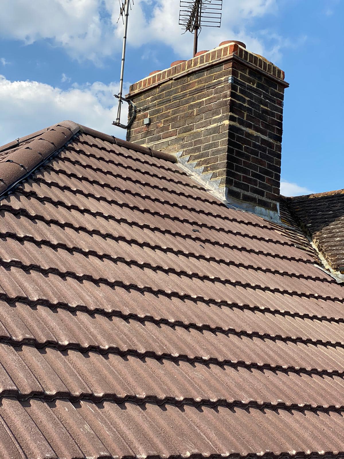 Professional roofers working on a property in London - KS Roof Master