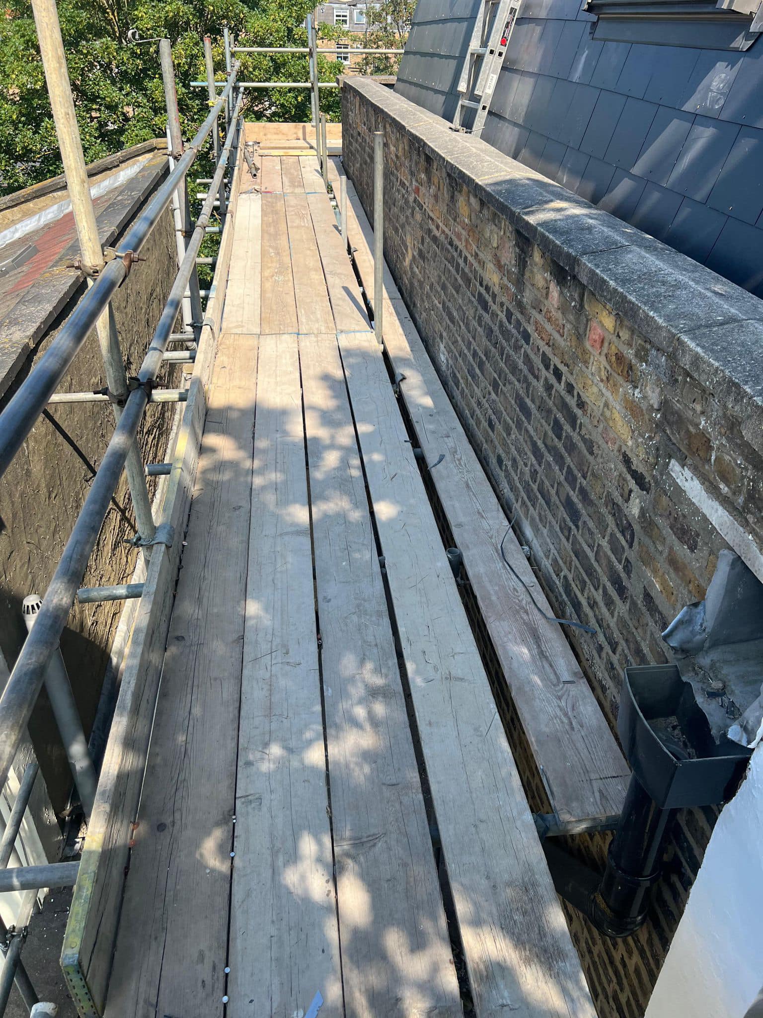 Flat roof coating in Brixton