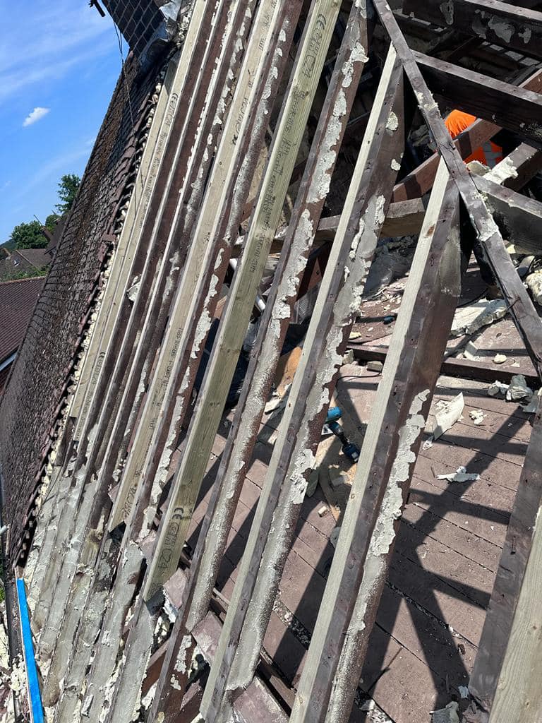 Professional roofers working on a property in London - KS Roof Master