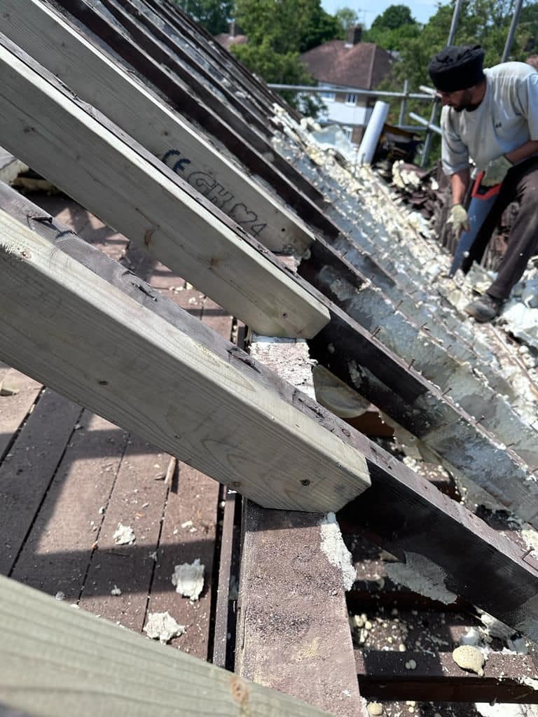 Professional roofers working on a property in London - KS Roof Master