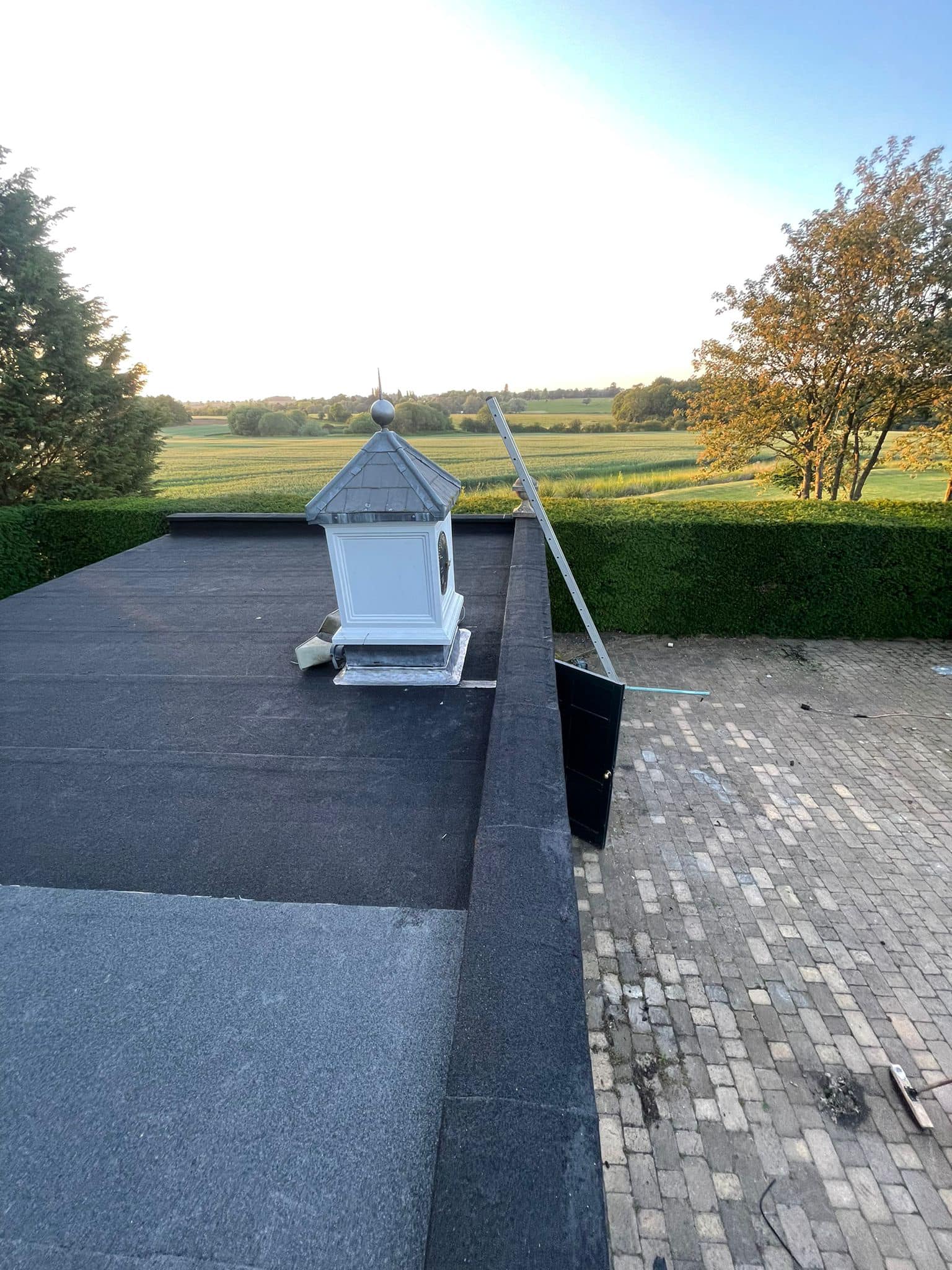 Professional roofers working on a property in London - KS Roof Master