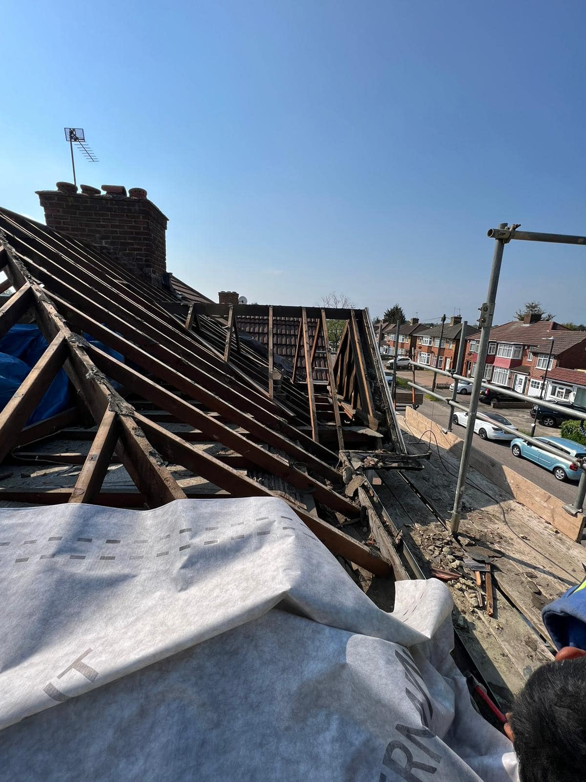 Professional roofers working on a property in London - KS Roof Master