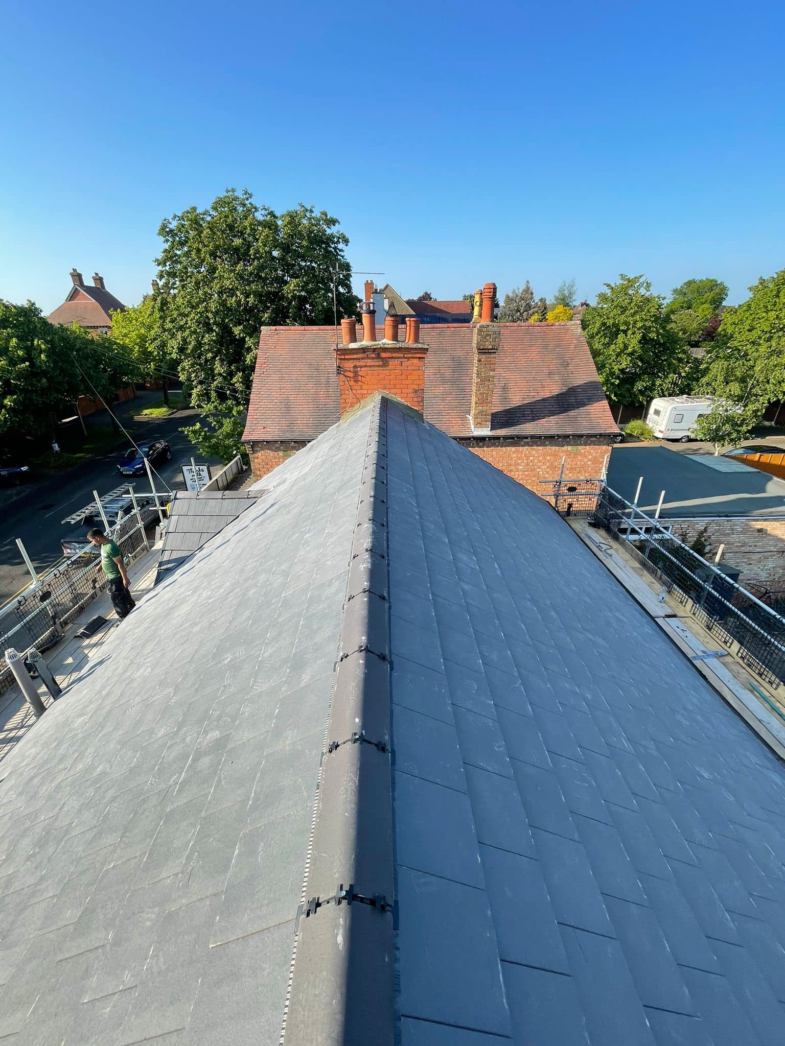 Professional roofers working on a property in London - KS Roof Master