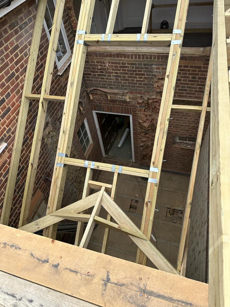 Professional roofers working on a property in London - KS Roof Master