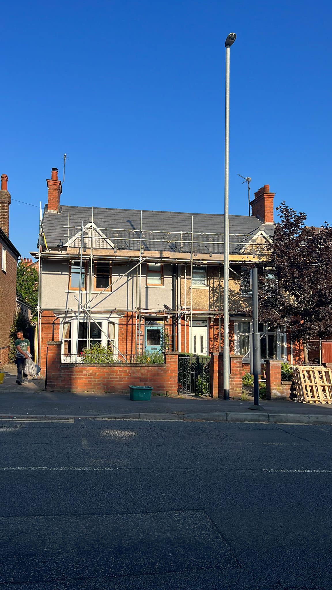 Professional roofers working on a property in London - KS Roof Master